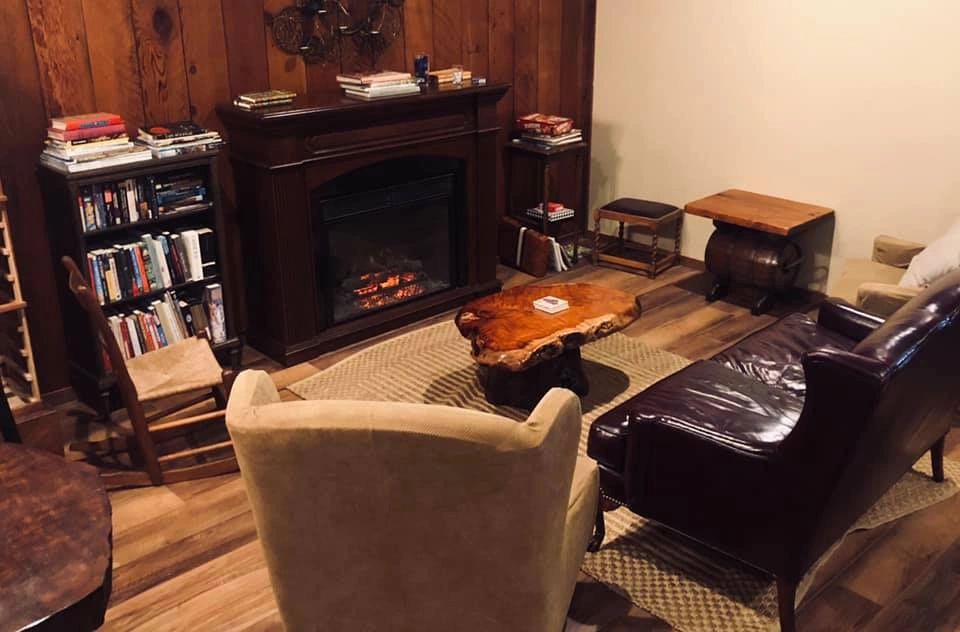 Restaurant lounge with library and fireplace