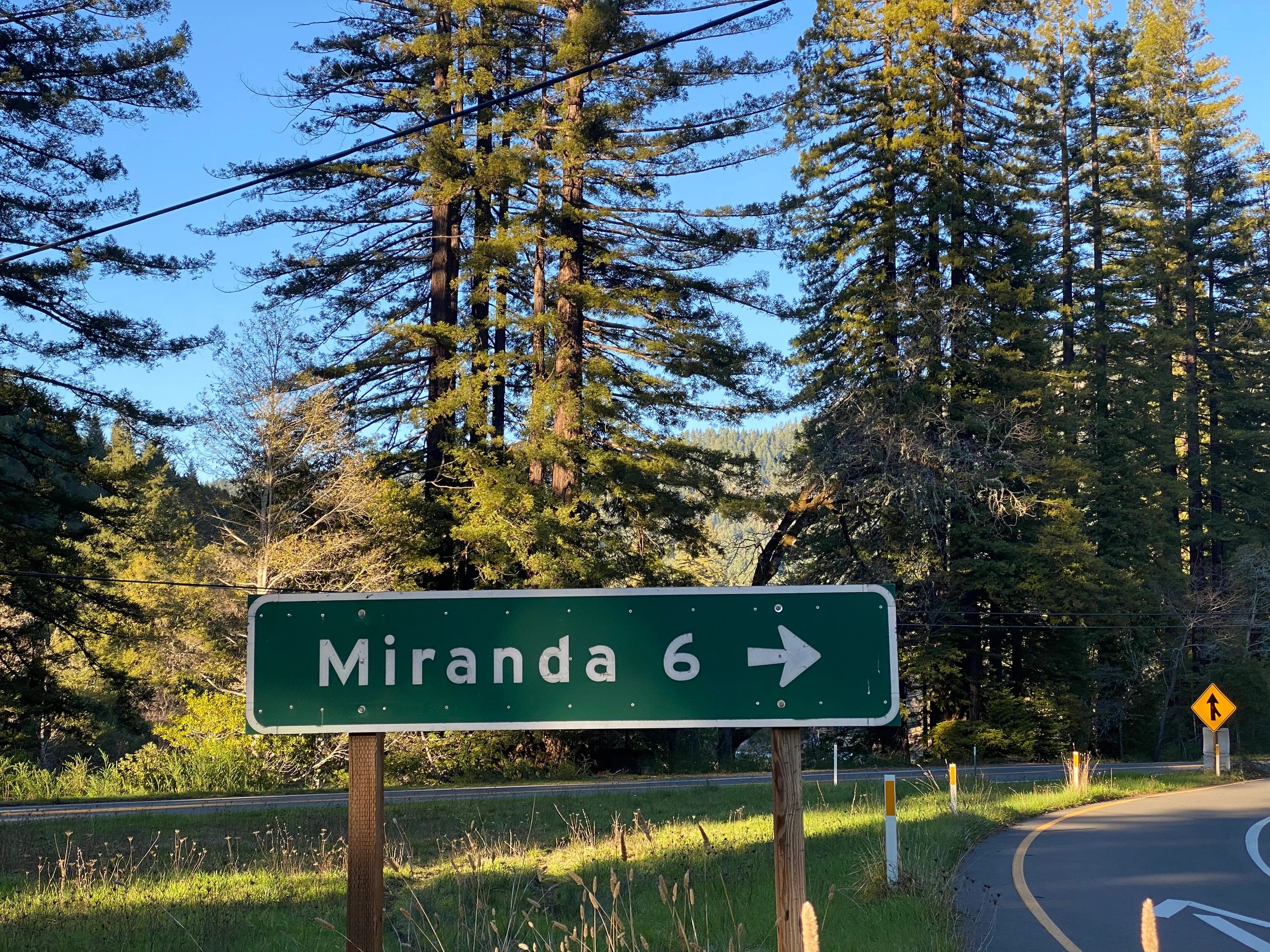 Miranda 6 miles road sign
